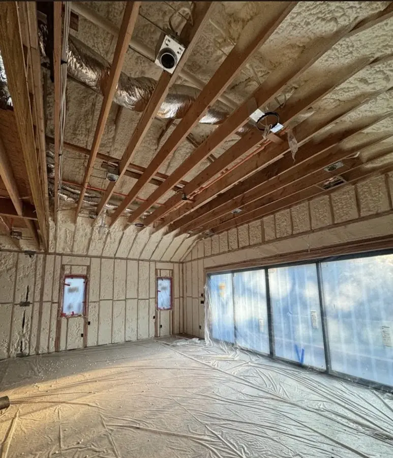 Interior walls and ceiling insulated with spray foam during new construction in Glenwood Springs